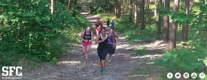 Surrey Fitness Centre memebrs running through woodland
